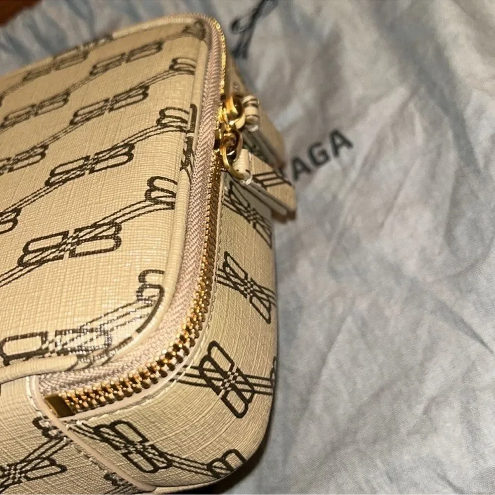 Authentic Balenciaga Signature BB Leather Pouch.